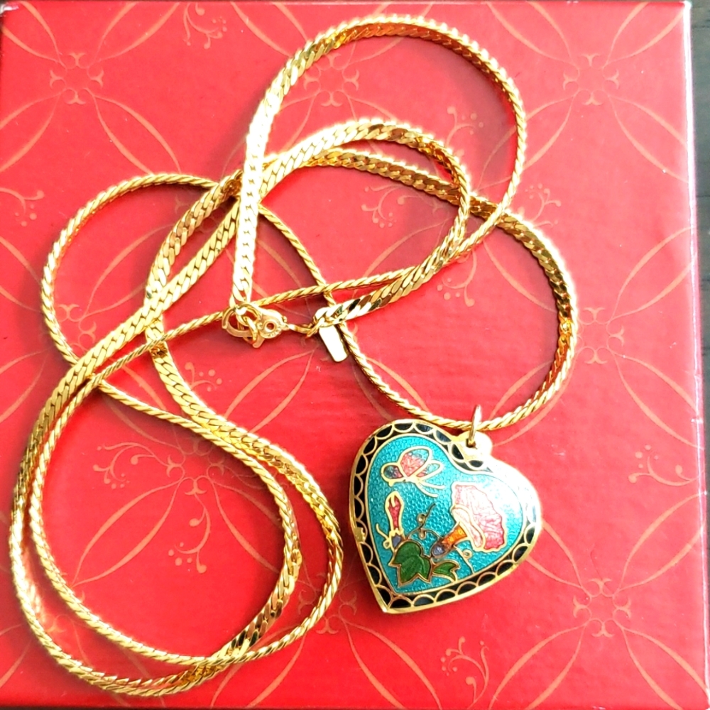Goldtone 27 inches monet heart necklace with butterfly and heart design